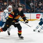 Jan 31, 2026; Vancouver, British Columbia, CAN; Vancouver Canucks forward Aatu Raty (54) skates against the Toronto Maple Leafs in the second period at Rogers Arena.