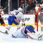 Feb 22, 2025; Philadelphia, Pennsylvania, USA; Edmonton Oilers goalie Stuart Skinner (74) allows a goal to Philadelphia Flyers right wing Matvei Michkov (39) in the first period at Wells Fargo Center.