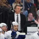 Oct 13, 2026; Salt Lake City, Utah, USA; Toronto Maple Leafs head coach Jim Hiller looks on against the Utah Mammoth during the third period at Delta Center.