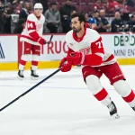 Oct 10, 2026; Montreal, Quebec, CAN; Detroit Red Wings center Dylan Larkin (71) skates during warm-up before the game against the Montreal Canadiens at Bell Centre.