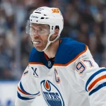 Oct 1, 2026; Vancouver, British Columbia, CAN; Edmonton Oilers forward Connor McDavid (97) during a stop in play against the Vancouver Canucks in the first period at Rogers Arena