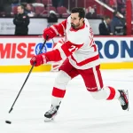 10 octobre 2026 ; Montréal, Québec, Canada ; le joueur de centre des Red Wings de Détroit, Dylan Larkin (71), décoche un tir lors de l'échauffement précédant le match contre les Canadiens de Montréal au Centre Bell.