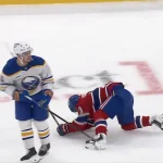 Zach Benson elbow on Cole Caufield