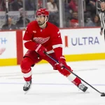 Oct 17, 2026; Detroit, Michigan, USA; Detroit Red Wings center Dylan Larkin (71) handles the puck during the second period against the San Jose Sharks at Little Caesars Arena.