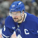 Oct 17, 2026; Toronto, Ontario, CAN; Toronto Maple Leafs center Auston Matthews (34) gets ready for a faceoff against the New York Islanders during the third period at Scotiabank Arena.