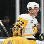 Oct 17, 2026; Las Vegas, Nevada, USA; Pittsburgh Penguins center Sidney Crosby (87) celebrates his second-period goal against the Vegas Golden Knights at T-Mobile Arena.