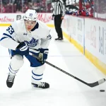 Sep 19, 2026; Montreal, Quebec, CAN; Toronto Maple Leafs Easton Cowan right wing (53) plays the puck against the Montreal Canadiens during the first period at Bell Centre. :