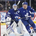 Oct 17, 2026; Toronto, Ontario, CAN; Toronto Maple Leafs defenseman Darren Raddysh (43) and goaltender Sergei Bobrovsky (72) look for the puck against the New York Islanders during the second period at Scotiabank Arena.
