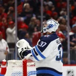Mar 24, 2024; Washington, District of Columbia, USA; Winnipeg Jets goaltender Connor Hellebuyck (37) looks on after allowing a goal by the Washington Capitals during the third period at Capital One Arena.