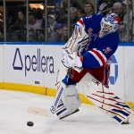 Oct 4, 2026; New York, New York, USA; New York Rangers goaltender Igor Shesterkin (31) attempts a shot against the Utah Mammoth during the third period at Madison Square Garden.