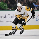 Dec 7, 2025; Dallas, Texas, USA; Pittsburgh Penguins center Ben Kindel (81) skates against the Dallas Stars during the game at the American Airlines Center.
