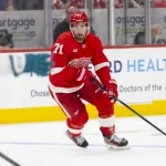 Oct 17, 2026; Detroit, Michigan, USA; Detroit Red Wings center Dylan Larkin (71) handles the puck during the second period against the San Jose Sharks at Little Caesars Arena.