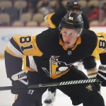Sep 21, 2026; Pittsburgh, Pennsylvania, USA; Pittsburgh Penguins center Ben Kindel (81) prepares to take a face-off against the Buffalo Sabres during the first period at PPG Paints Arena. Mandatory Credit: Charles LeClaire-Imagn Images