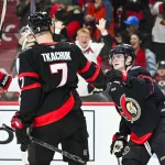 Jan 31, 2026; Ottawa, Ontario, CAN; Ottawa Senators center Tim Stutzle (18) celebrates with left wing Brady Tkachuk (7) his goal against the New Jersey Devils during the third period at Canadian Tire Centre.