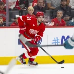 Oct 17, 2026; Detroit, Michigan, USA; Detroit Red Wings center Dylan Larkin (71) handles the puck during the third period against the San Jose Sharks at Little Caesars Arena.