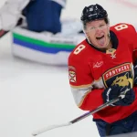 Oct 15, 2026; Sunrise, Florida, USA; Florida Panthers left wing Brady Tkachuk (8) celebrates after scoring the winning goal against the Vancouver Canucks during overtime at Amerant Bank Arena. Mandatory Credit: Sam Navarro-Imagn Images