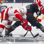 Insider reveals the Minnesota Wild's trade offer for Dylan Larkin Oct 20, 2026; Seattle, Washington, USA; Detroit Red Wings center Dylan Larkin (71) wins a face off against Seattle Kraken center Matty Beniers (10) during the first period at Climate Pledge Arena.