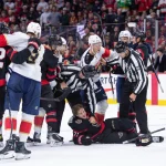 NHL hits two players with maximum punishments after chaotic Senators-Panthers clash Oct 21, 2026; Ottawa, Ontario, CAN; Florida Panthers center Sam Bennett (9) takes a penalty for slashing following a scuffle between left wing Brady Tkachuk and Ottawa Senators center Ridly Greig (71) in the second period at the Canadian Tire Centre. Mandatory Credit: Marc DesRosiers-Imagn
