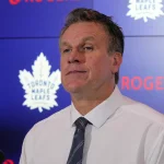 Oct 17, 2026; Toronto, Ontario, CAN; Toronto Maple Leafs head coach Jim Hiller listens to questions from the media after a loss to the New York Islanders at Scotiabank Arena.