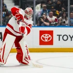 Oct 22, 2026; Vancouver, British Columbia, CAN; Detroit Red Wings goalie John Gibson (36) handles the puck against the Vancouver Canucks in the second period at Rogers Arena.