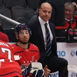 Sep 25, 2026; Washington, District of Columbia, USA; Washington Capitals head coach Spencer Carbery looks on from behind the bench against the Boston Bruins during the first period at Capital One Arena.