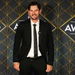Jun 27, 2024; Las Vegas, Nevada, USA; Connor Hellebuyck appears on a red carpet before the start of the 2024 NHL Awards at Fontainebleau Las Vegas.