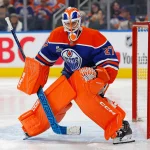 Oct 20, 2026; Edmonton, Alberta, CAN; Edmonton Oilers goaltender Devon Levi (27) gets ready to face a shot against the Minnesota Wild at Rogers Place. Mandatory Credit: Perry Nelson-Imagn Images
