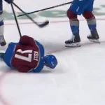 D'Astous cross-checks Parker Kelly