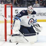Apr 4, 2026; Columbus, Ohio, USA; Winnipeg Jets goalie Connor Hellebuyck (37) makes a save against the Columbus Blue Jackets during the second period at Nationwide Arena.