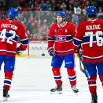 Oct 13, 2026; Montreal, Quebec, CAN; Montreal Canadiens right wing Josh Anderson (17) celebrates with defenseman Adam Engstrom (42) and right wing Zachary Bolduc (76) his goal against the Buffalo Sabres during the second period at Bell Centre.