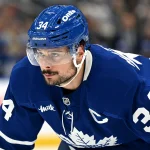 Oct 19, 2026; Toronto, Ontario, CAN; Toronto Maple Leafs forward Auston Matthews (34) prepares to take a faceoff against the San Jose Sharks in the first period at Scotiabank Arena.