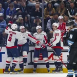 Mar 26, 2026; Salt Lake City, Utah, USA; The Washington Capitals celebrate a goal against the Utah Mammoth by left wing Ivan Miroshnichenko (63) during the third period at Delta Center.