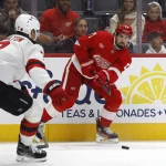 Oct 13, 2026; Detroit, Michigan, USA; Detroit Red Wings center Dylan Larkin (71) skates with the puck in the second period against the New Jersey Devils at Little Caesars Arena.