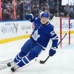 Oct 22, 2026; Toronto, Ontario, CAN; Toronto Maple Leafs right wing Easton Cowan (53) celebrates scoring a goal against the New York Rangers during the first period at Scotiabank Arena.