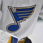 Dec 14, 2024; Dallas, Texas, USA; A view of the Blues logo on the jersey of St. Louis Blues goaltender Jordan Binnington (50) during the game between the Dallas Stars and the St. Louis Blues at American Airlines Center.