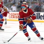 Oct 25, 2026; Winnipeg, Manitoba, CAN; Montreal Canadiens right wing Cole Caufield (13) arms up before Game against the Winnipeg Jets during the 2026 Heritage Classic ice hockey game at Princess Auto Stadium. Mandatory Credit: James Carey Lauder-Imagn Images