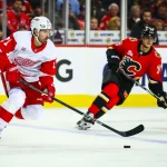 Elliotte Friedman reveals who the Red Wings are targeting in Dylan Larkin trade with Wild Oct 24, 2026; Calgary, Alberta, CAN; Detroit Red Wings center Dylan Larkin (71) skates with the puck against the Calgary Flames during the second period at Scotiabank Saddledome.