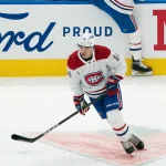Feb 13, 2021; Toronto, Ontario, CAN; Montreal Canadiens center Nick Suzuki (14) skates during the warm-up against the Toronto Maple Leafs at Scotiabank Arena.