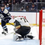 Oct 24, 2026; Columbus, Ohio, USA; Vegas Golden Knights goalie Carter Hart (79) makes a save on the shot from Columbus Blue Jackets Center Kent Johnson (91) during overtime at Nationwide Arena.