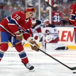Oct 25, 2026; Winnipeg, Manitoba, CAN; Montreal Canadiens defenseman Arber Xhekaj (72) arms up before Game against the Winnipeg Jets during the 2026 Heritage Classic ice hockey game at Princess Auto Stadium
