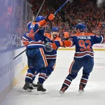 Apr 20, 2026; Edmonton, Alberta, CAN; Edmonton Oilers defenseman Mattias Ekholm (14) and Oilers right winger Kasperi Kapanen (42) Oilers defenseman Jake Walman (96) and Oilers right winger Vasily Podkolzin (92) celebrate a goal on the Anaheim Ducks in game one of the first round of the 2026 Stanley Cup Playoffs during the third period at Rogers Place.