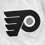 Mar 28, 2024; Montreal, Quebec, CAN; View of a Philadelphia Flyers logo on a jersey worn by a member of the team against the Montreal Canadiens during the second period at Bell Centre.