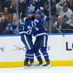 Oct 22, 2026; Toronto, Ontario, CAN; Toronto Maple Leafs right wing Kirill Marchenko (86) scores a goal and celebrates with right wing William Nylander (88) against the New York Rangers during the second period at Scotiabank Arena.