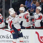 Mar 26, 2026; Salt Lake City, Utah, USA; The Washington Capitals celebrate a goal against the Utah Mammoth by left wing Ivan Miroshnichenko (63) during the first period at Delta Center.