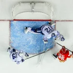 Oct 26, 2026; Calgary, Alberta, CAN; Toronto Maple Leafs goaltender Sergei Bobrovsky (72) makes a save against Calgary Flames left wing Joel Farabee (86) during the third period at Scotiabank Saddledome.