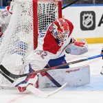 Oct 27, 2026; St. Louis, Missouri, USA; Montreal Canadiens goaltender Jacob Fowler (32) blocks a shot from the St. Louis Blues in the second period at Enterprise Center.