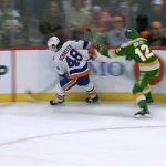 Matthew Schaefer takes a high stick from Matt Boldy in one of the season's worst non-calls