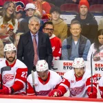 Oct 24, 2026; Calgary, Alberta, CAN; Detroit Red Wings head coach Todd McLellan on his bench against the Calgary Flames during the first period at Scotiabank Saddledome.