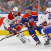 Deux jeunes v&eacute;t&eacute;rans en attaque quittent imm&eacute;diatement les Oilers en pr&eacute;vision de lembauche de Mike Babcock