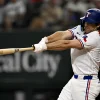 Blue Jays acquire infielder and pitcher from the Rangers in 3-player trade